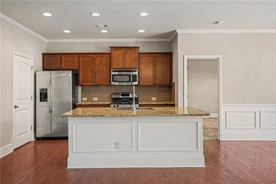 Hidden at the end of a quiet cul-de-sac in Heron Bay Villas on Canongate At Heron Bay in Georgia - for sale on GolfHomes.com, golf home, golf lot