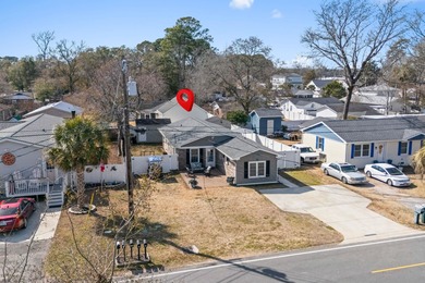 Coastal breezes, golf cart rides, and laid-back beach living on Tupelo Bay Golf Complex  in South Carolina - for sale on GolfHomes.com, golf home, golf lot