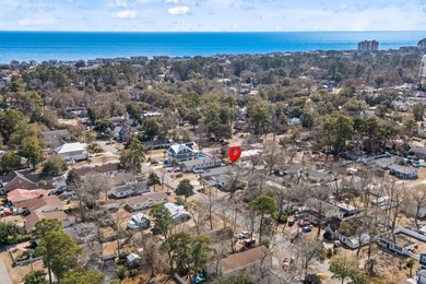Coastal breezes, golf cart rides, and laid-back beach living on Tupelo Bay Golf Complex  in South Carolina - for sale on GolfHomes.com, golf home, golf lot