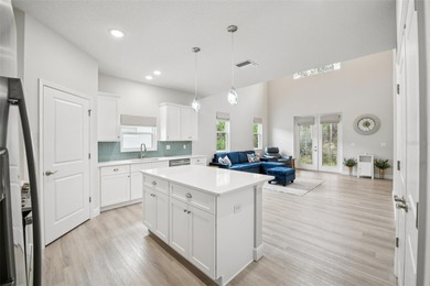 Welcome to this beautifully built 2023 Johnson Group Homes *Key on Venetian Bay Golf Course in Florida - for sale on GolfHomes.com, golf home, golf lot