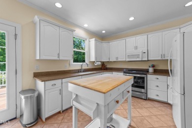 Fall in love with this beautiful custom-built brick front home on The Neuse Golf Club in North Carolina - for sale on GolfHomes.com, golf home, golf lot
