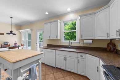 Fall in love with this beautiful custom-built brick front home on The Neuse Golf Club in North Carolina - for sale on GolfHomes.com, golf home, golf lot