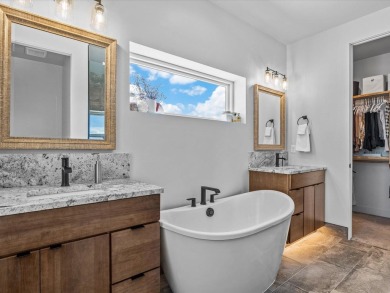 Experience Unparalleled Luxury and Breathtaking Views at this on The Golf Club At Redlands Mesa in Colorado - for sale on GolfHomes.com, golf home, golf lot