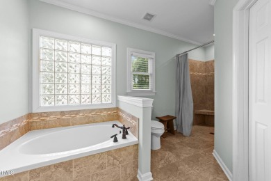 Fall in love with this beautiful custom-built brick front home on The Neuse Golf Club in North Carolina - for sale on GolfHomes.com, golf home, golf lot