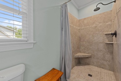 Fall in love with this beautiful custom-built brick front home on The Neuse Golf Club in North Carolina - for sale on GolfHomes.com, golf home, golf lot