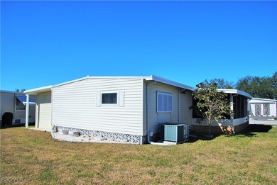 This well-maintained residence offers comfort, style, and peace on Six Lakes Country Club in Florida - for sale on GolfHomes.com, golf home, golf lot