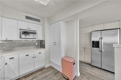 Incredible opportunity to own this stunning renovated 8th floor on Las Vegas Country Club in Nevada - for sale on GolfHomes.com, golf home, golf lot