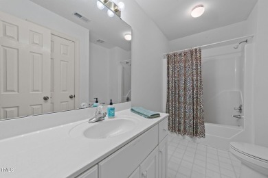 Fall in love with this beautiful custom-built brick front home on The Neuse Golf Club in North Carolina - for sale on GolfHomes.com, golf home, golf lot