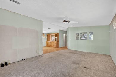 Located in beautiful Fox Run, this 2-bedroom 2-bath home on Bay Tree Golf Course in Florida - for sale on GolfHomes.com, golf home, golf lot