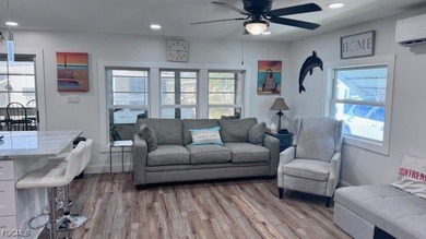 Experience luxury living in this beautifully remodeled on Riverbend Golf and Country Club in Florida - for sale on GolfHomes.com, golf home, golf lot