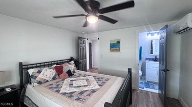 Experience luxury living in this beautifully remodeled on Riverbend Golf and Country Club in Florida - for sale on GolfHomes.com, golf home, golf lot