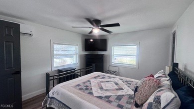 Experience luxury living in this beautifully remodeled on Riverbend Golf and Country Club in Florida - for sale on GolfHomes.com, golf home, golf lot