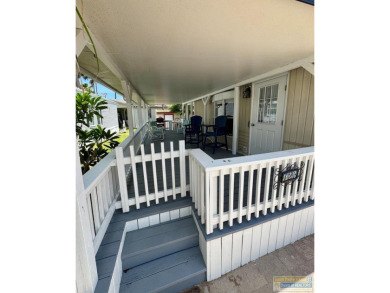 Cute and nicely updated park model featuring large full length on Long Island Golf Course in Texas - for sale on GolfHomes.com, golf home, golf lot