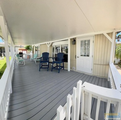 Cute and nicely updated park model featuring large full length on Long Island Golf Course in Texas - for sale on GolfHomes.com, golf home, golf lot