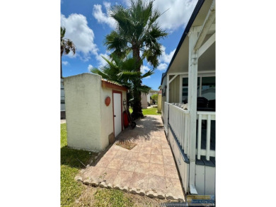 Cute and nicely updated park model featuring large full length on Long Island Golf Course in Texas - for sale on GolfHomes.com, golf home, golf lot