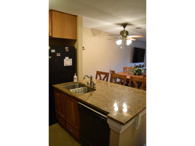This beautiful condo is being offered fully furnished! There is on Indian Hills Country Club in Arkansas - for sale on GolfHomes.com, golf home, golf lot