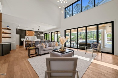 Experience elevated living in this custom luxury home located in on North Ridge Country Club in North Carolina - for sale on GolfHomes.com, golf home, golf lot