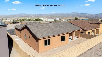 The flagship model of Belle Air Heights can be constructed on on Laughlin Ranch Golf Club in Arizona - for sale on GolfHomes.com, golf home, golf lot