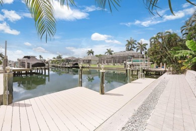 As you step through the grand entrance of this magnificent Marco on Island Country Club in Florida - for sale on GolfHomes.com, golf home, golf lot