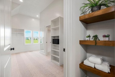 The Sequoia floor plan is a reverse 1.5-story home that offers on Heritage Park Golf Course in Kansas - for sale on GolfHomes.com, golf home, golf lot