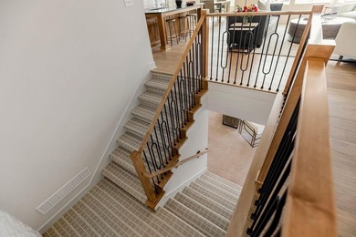 The Sequoia floor plan is a reverse 1.5-story home that offers on Heritage Park Golf Course in Kansas - for sale on GolfHomes.com, golf home, golf lot