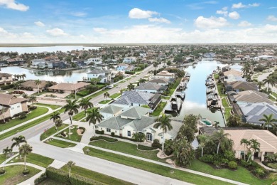 As you step through the grand entrance of this magnificent Marco on Island Country Club in Florida - for sale on GolfHomes.com, golf home, golf lot