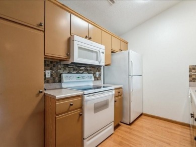 Welcome to easy living in this bright and airy 2-bedroom, 2-bath on St. Andrews Golf Club in Iowa - for sale on GolfHomes.com, golf home, golf lot