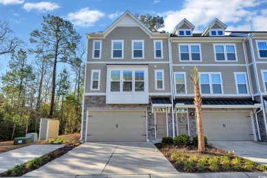 This beautifully furnished townhome shows like a model, offering on Barefoot Resort-Dye in South Carolina - for sale on GolfHomes.com, golf home, golf lot