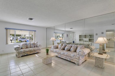 Welcome to one of the most unique waterfront homes in Cypress on Cypress Lakes Golf Course - West Palm Beach in Florida - for sale on GolfHomes.com, golf home, golf lot