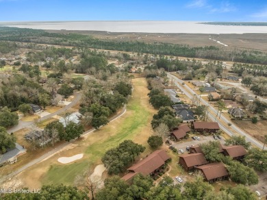 BEAUTIFULLY UPDATED TOP FLOOR GOLF COURSE UNIT WITH 2 BEDROOMS on Diamondhead Country Club in Mississippi - for sale on GolfHomes.com, golf home, golf lot