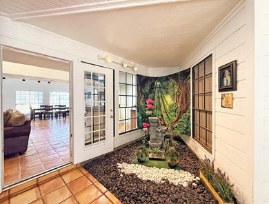 This classic-style 2-story residence is a statement of elegance on Rockport Country Club in Texas - for sale on GolfHomes.com, golf home, golf lot