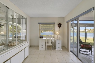 Welcome to one of the most unique waterfront homes in Cypress on Cypress Lakes Golf Course - West Palm Beach in Florida - for sale on GolfHomes.com, golf home, golf lot