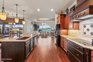 SITED ON PARK-LIKE GROUNDS WITHIN PROMENADE PARKE, THE on Venetian Bay Golf Course in Florida - for sale on GolfHomes.com, golf home, golf lot