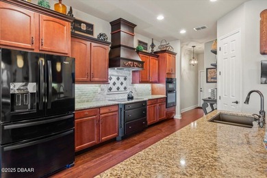 SITED ON PARK-LIKE GROUNDS WITHIN PROMENADE PARKE, THE on Venetian Bay Golf Course in Florida - for sale on GolfHomes.com, golf home, golf lot