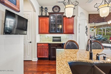 SITED ON PARK-LIKE GROUNDS WITHIN PROMENADE PARKE, THE on Venetian Bay Golf Course in Florida - for sale on GolfHomes.com, golf home, golf lot