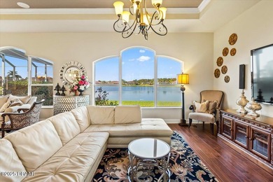 SITED ON PARK-LIKE GROUNDS WITHIN PROMENADE PARKE, THE on Venetian Bay Golf Course in Florida - for sale on GolfHomes.com, golf home, golf lot