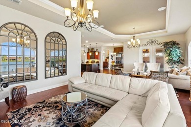 SITED ON PARK-LIKE GROUNDS WITHIN PROMENADE PARKE, THE on Venetian Bay Golf Course in Florida - for sale on GolfHomes.com, golf home, golf lot