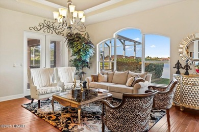 SITED ON PARK-LIKE GROUNDS WITHIN PROMENADE PARKE, THE on Venetian Bay Golf Course in Florida - for sale on GolfHomes.com, golf home, golf lot