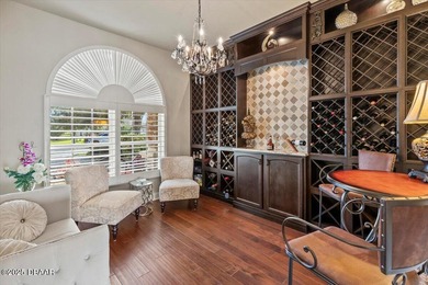 SITED ON PARK-LIKE GROUNDS WITHIN PROMENADE PARKE, THE on Venetian Bay Golf Course in Florida - for sale on GolfHomes.com, golf home, golf lot