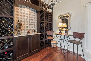 SITED ON PARK-LIKE GROUNDS WITHIN PROMENADE PARKE, THE on Venetian Bay Golf Course in Florida - for sale on GolfHomes.com, golf home, golf lot