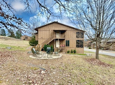 Upper level condo in a gated Lake Cumberland community. Condo on Woodson Bend Resort in Kentucky - for sale on GolfHomes.com, golf home, golf lot