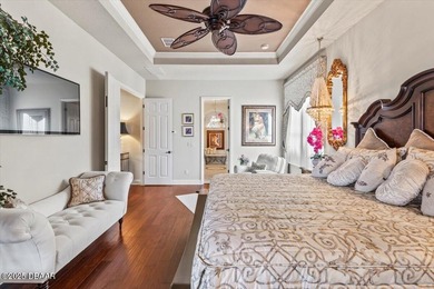 SITED ON PARK-LIKE GROUNDS WITHIN PROMENADE PARKE, THE on Venetian Bay Golf Course in Florida - for sale on GolfHomes.com, golf home, golf lot