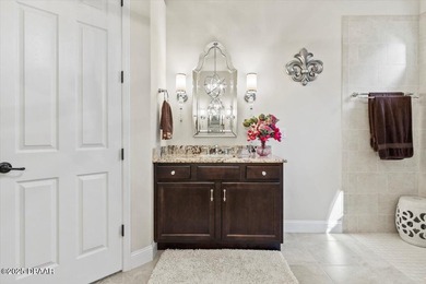 SITED ON PARK-LIKE GROUNDS WITHIN PROMENADE PARKE, THE on Venetian Bay Golf Course in Florida - for sale on GolfHomes.com, golf home, golf lot