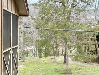 Upper level condo in a gated Lake Cumberland community. Condo on Woodson Bend Resort in Kentucky - for sale on GolfHomes.com, golf home, golf lot