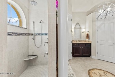 SITED ON PARK-LIKE GROUNDS WITHIN PROMENADE PARKE, THE on Venetian Bay Golf Course in Florida - for sale on GolfHomes.com, golf home, golf lot