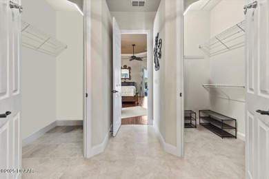 SITED ON PARK-LIKE GROUNDS WITHIN PROMENADE PARKE, THE on Venetian Bay Golf Course in Florida - for sale on GolfHomes.com, golf home, golf lot