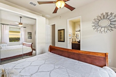 SITED ON PARK-LIKE GROUNDS WITHIN PROMENADE PARKE, THE on Venetian Bay Golf Course in Florida - for sale on GolfHomes.com, golf home, golf lot