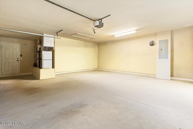 SITED ON PARK-LIKE GROUNDS WITHIN PROMENADE PARKE, THE on Venetian Bay Golf Course in Florida - for sale on GolfHomes.com, golf home, golf lot