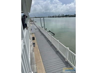 Rare intra-coastal property! Located on extra-large lot so on Long Island Golf Course in Texas - for sale on GolfHomes.com, golf home, golf lot