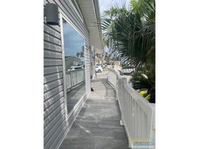 Rare intra-coastal property! Located on extra-large lot so on Long Island Golf Course in Texas - for sale on GolfHomes.com, golf home, golf lot